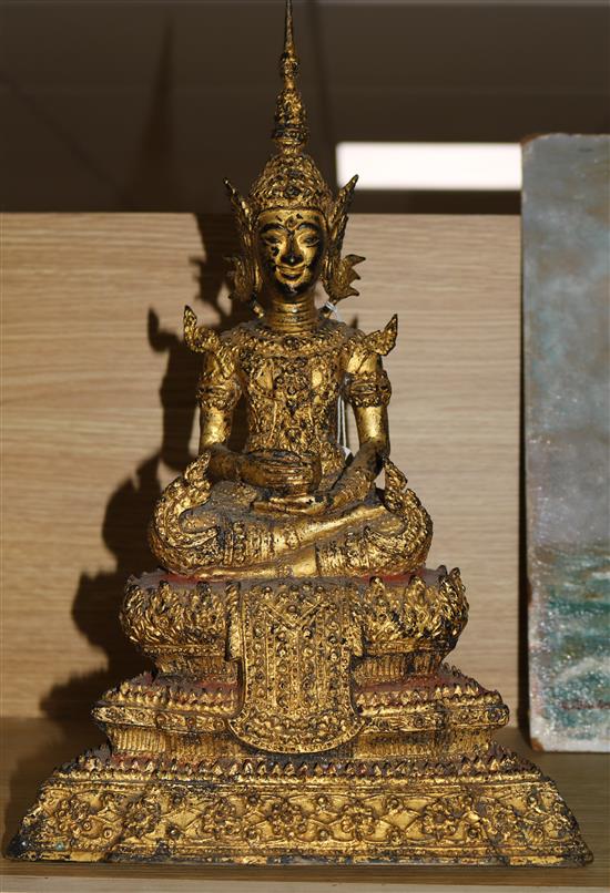 A large Thai gilt bronze figure of Buddha